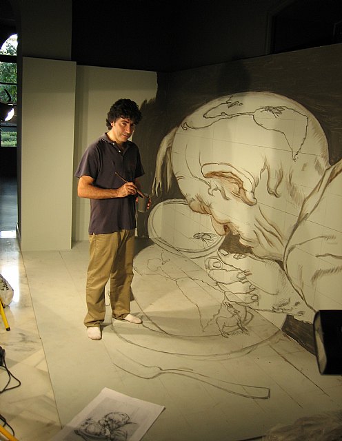 El artista argentino utiliza paredes y suelo para representar a la imagen de un científico